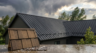 Midwest home with metal roof designed for hail impact resistance and high wind uplift performance.