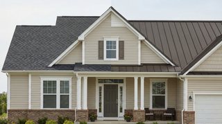 Metal roof versus asphalt shingles comparison on the same house showing differences in appearance and durability.